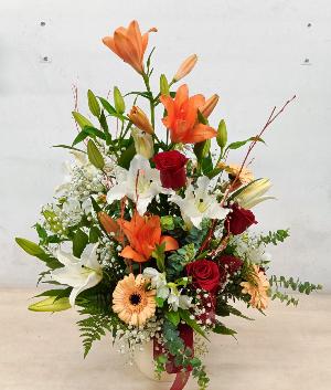 Centre amb flors de temporada tons suaus