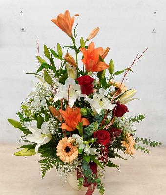 Centre amb flors de temporada tons suaus